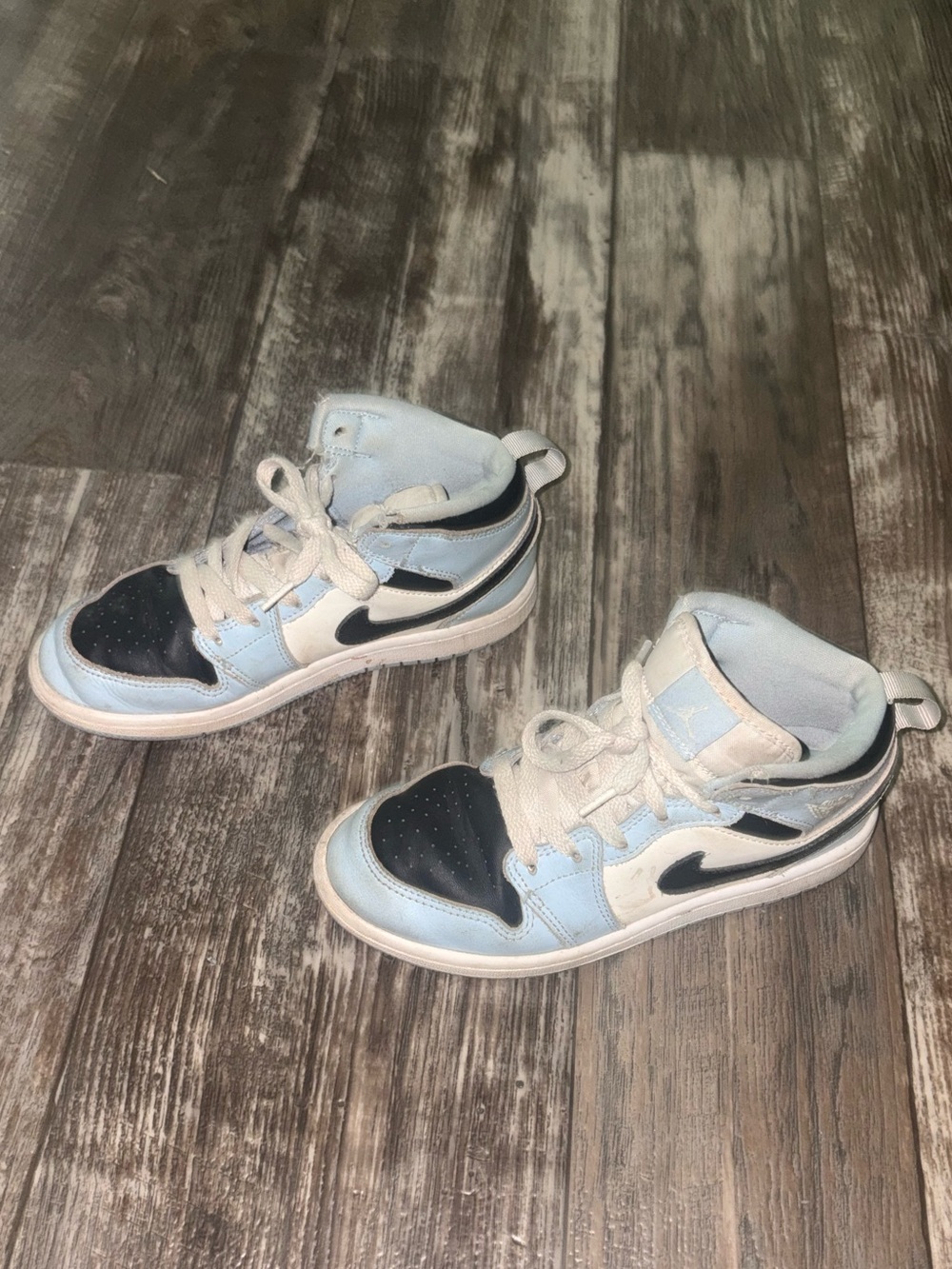 Boys Carolina Blue, Navy, and White Jordan’s - Size 2Y